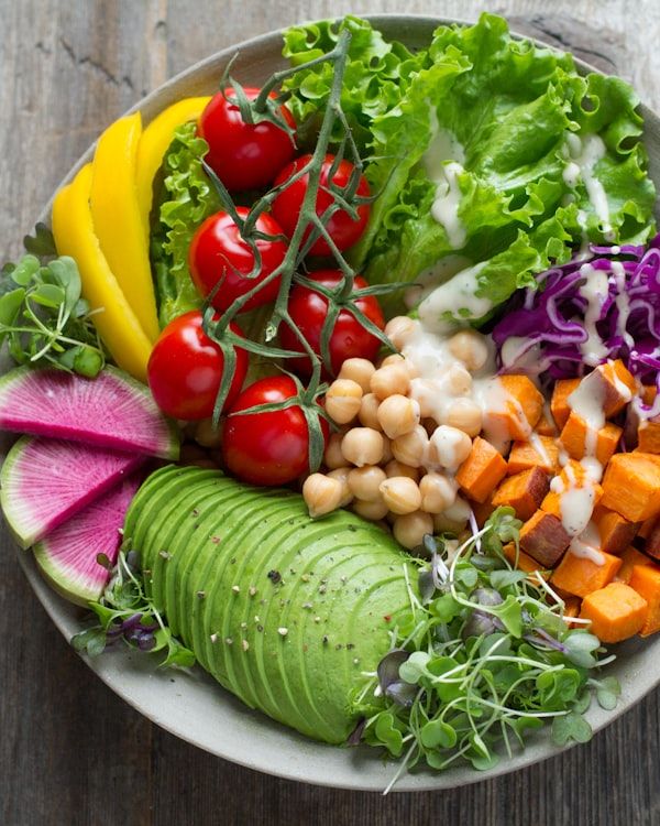 Colorful bowl with crispy chickpeas and fresh vegetables